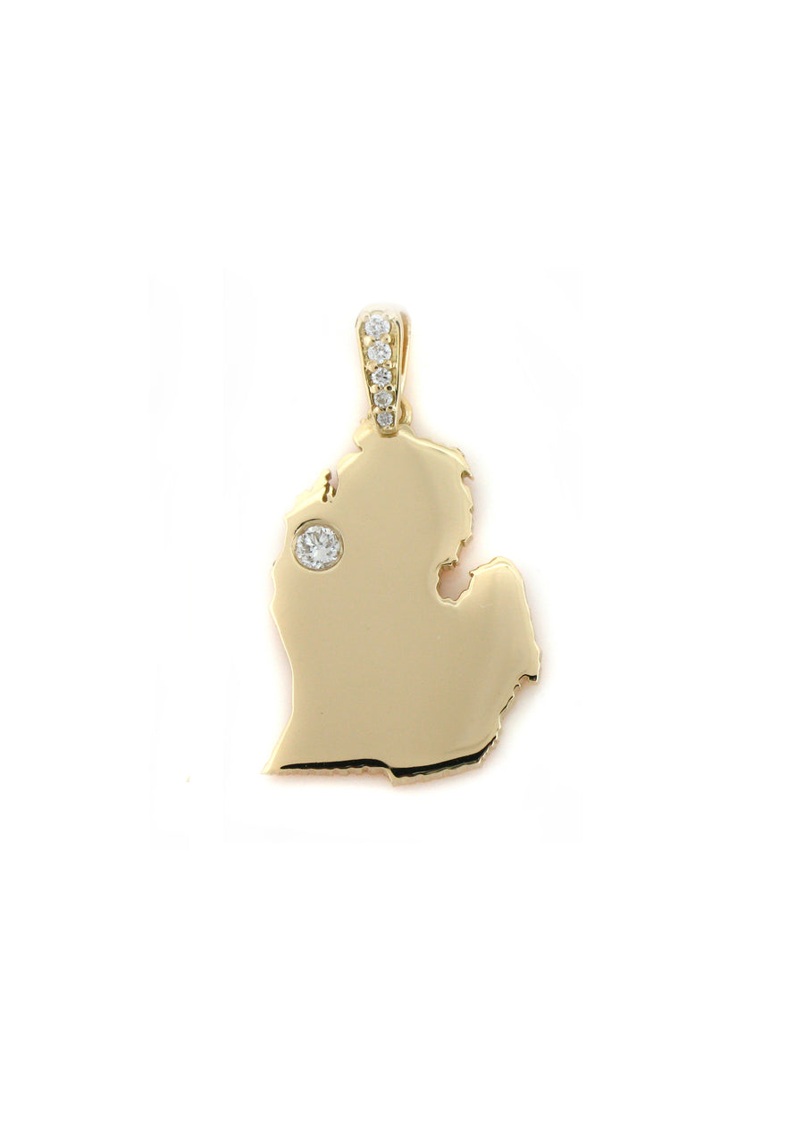 This custom made 18K gold and diamond pendant was made for a customer who lives near Traverse City, MI