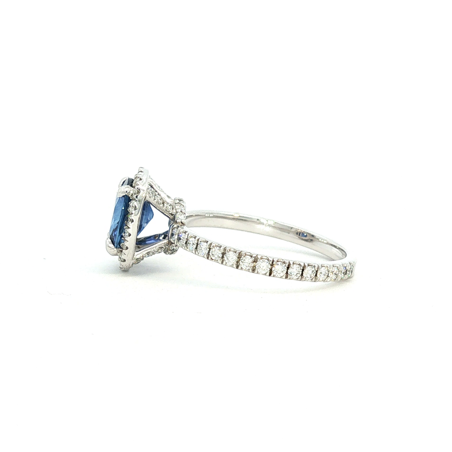Royal Blue Sapphire and Diamond Halo Ring in White Gold