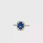 Royal Blue Sapphire and Diamond Halo Ring in White Gold